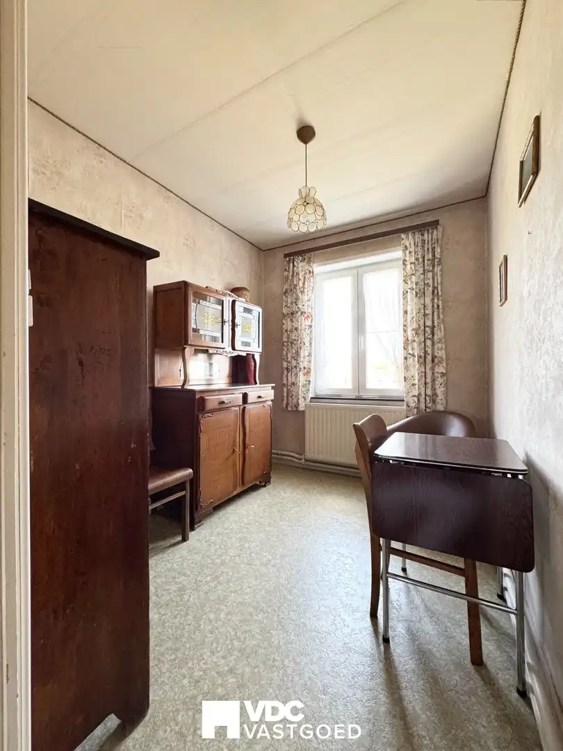 Charmante te renoveren woning met tuin, garage en sterk investeringspotentieel foto 13