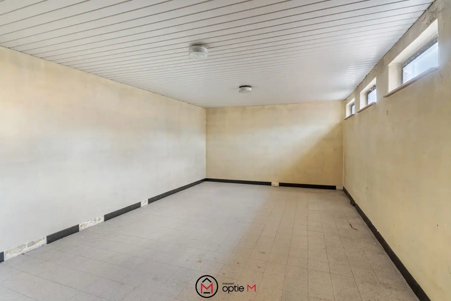 Karaktervolle woning met tuin te koop in centrum Bilzen foto 30