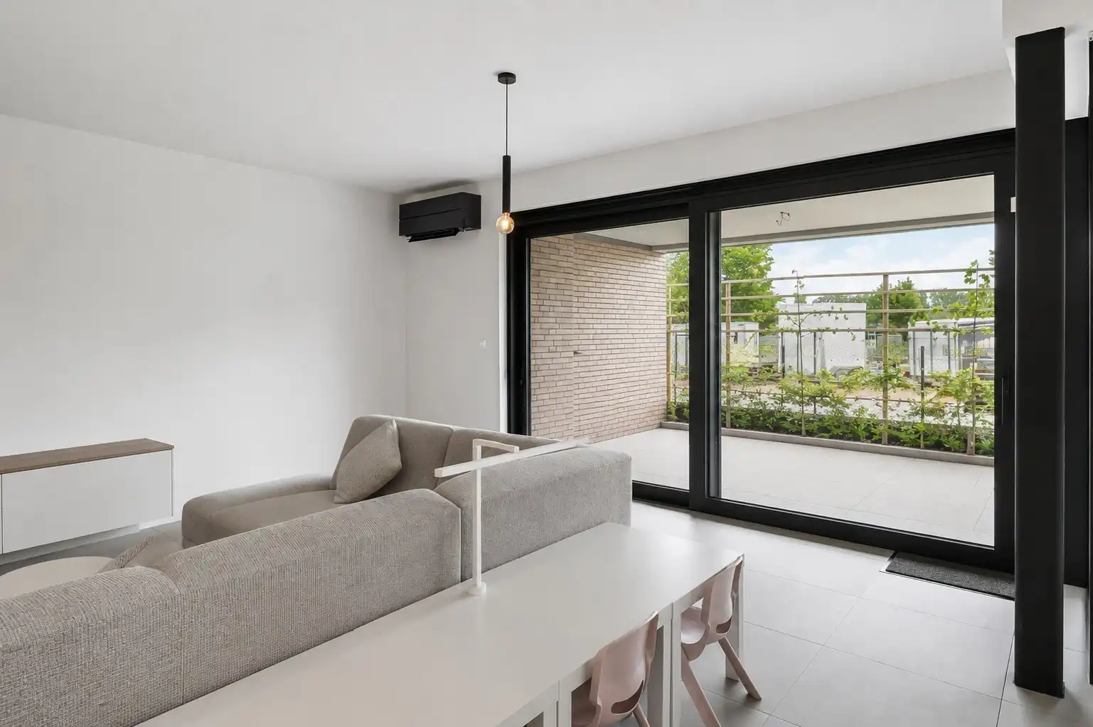 Nieuwbouwappartement met ruim terras, privétuin en ondergrondse staanplaats foto 4