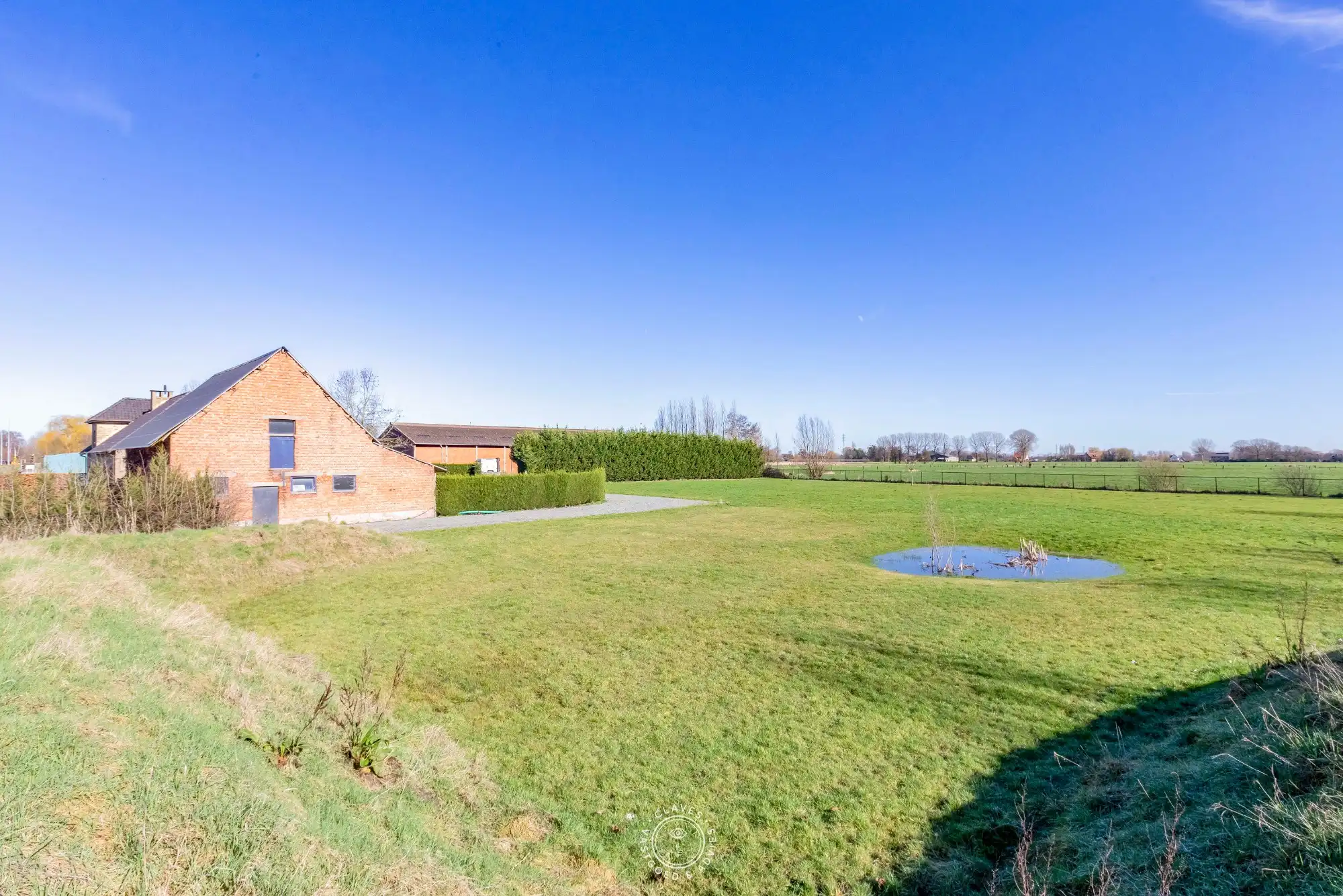 Open bebouwing met loods op uitzonderlijk perceel van +10.000 m² met adembenemend uitzicht foto 7
