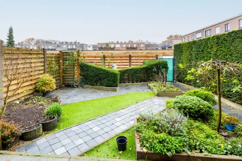 Gelijkvloers 2 slpk. appartement met tuin en garage foto 11