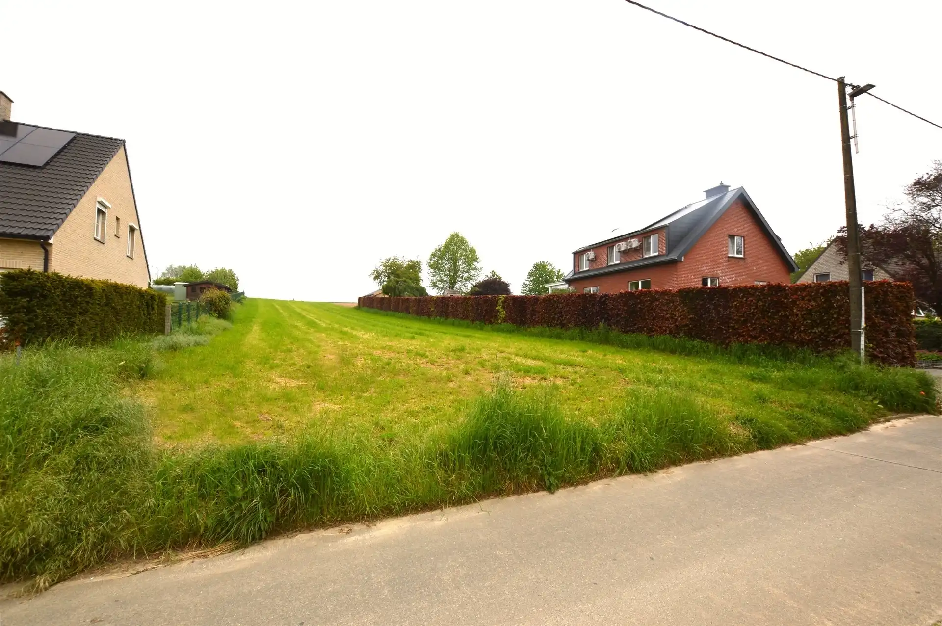 Bouwgrond van 50 are met groenzicht in Bekkerzeel foto {{pictureIndex}}