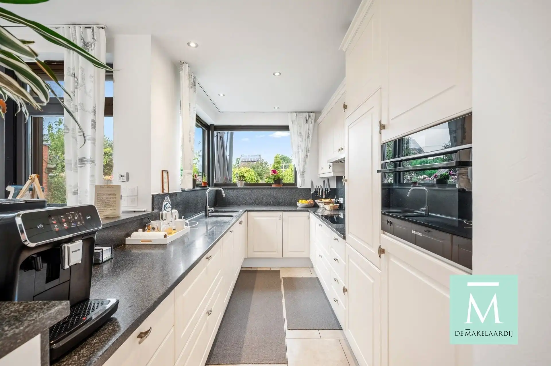 Volledig gerenoveerde woning met aangename tuin  foto 13