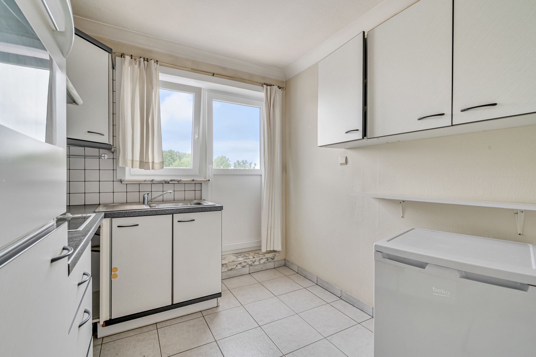 Op te frissen appartement met 2 slaapkamers en terras foto 7