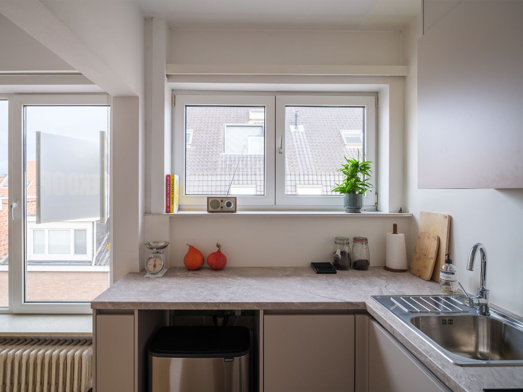 Karaktervol dakappartement met 2 slpk's op een gegeerde centrumlocatie foto 16