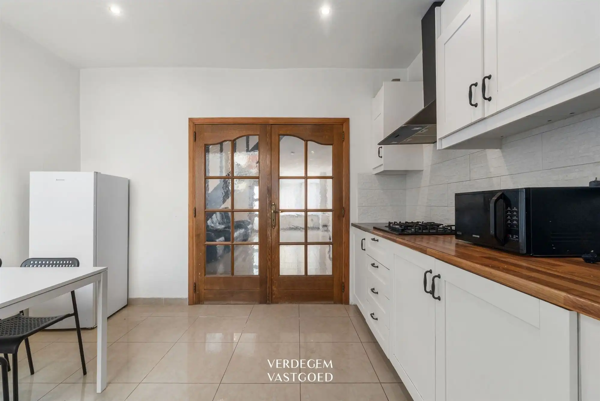 Instapklare woning met grote leefruimte en vier slaapkamers foto 3