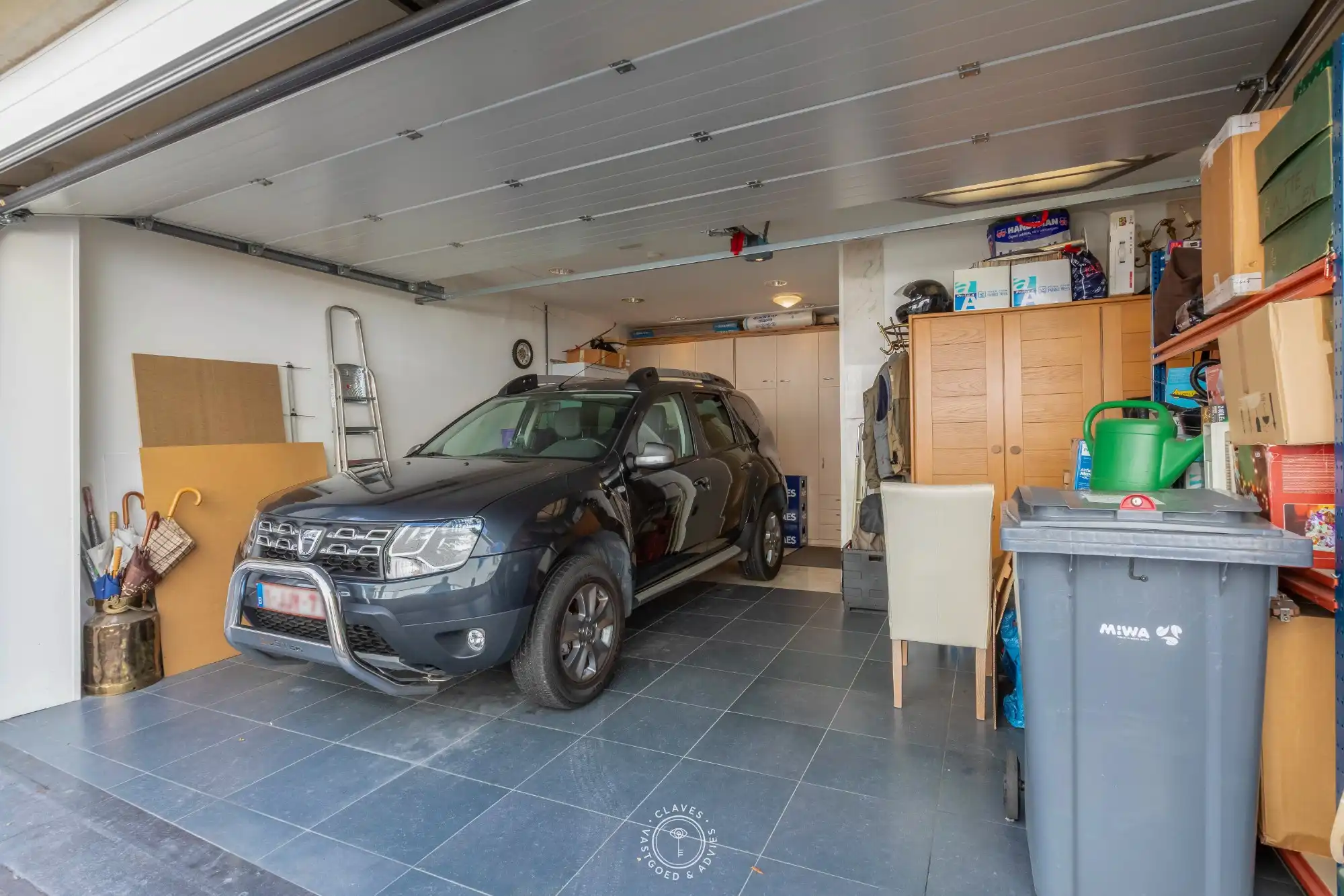 Opbrengsteigendom (ruime burgerwoning) bestaande uit 2 appartementen en garage foto 18