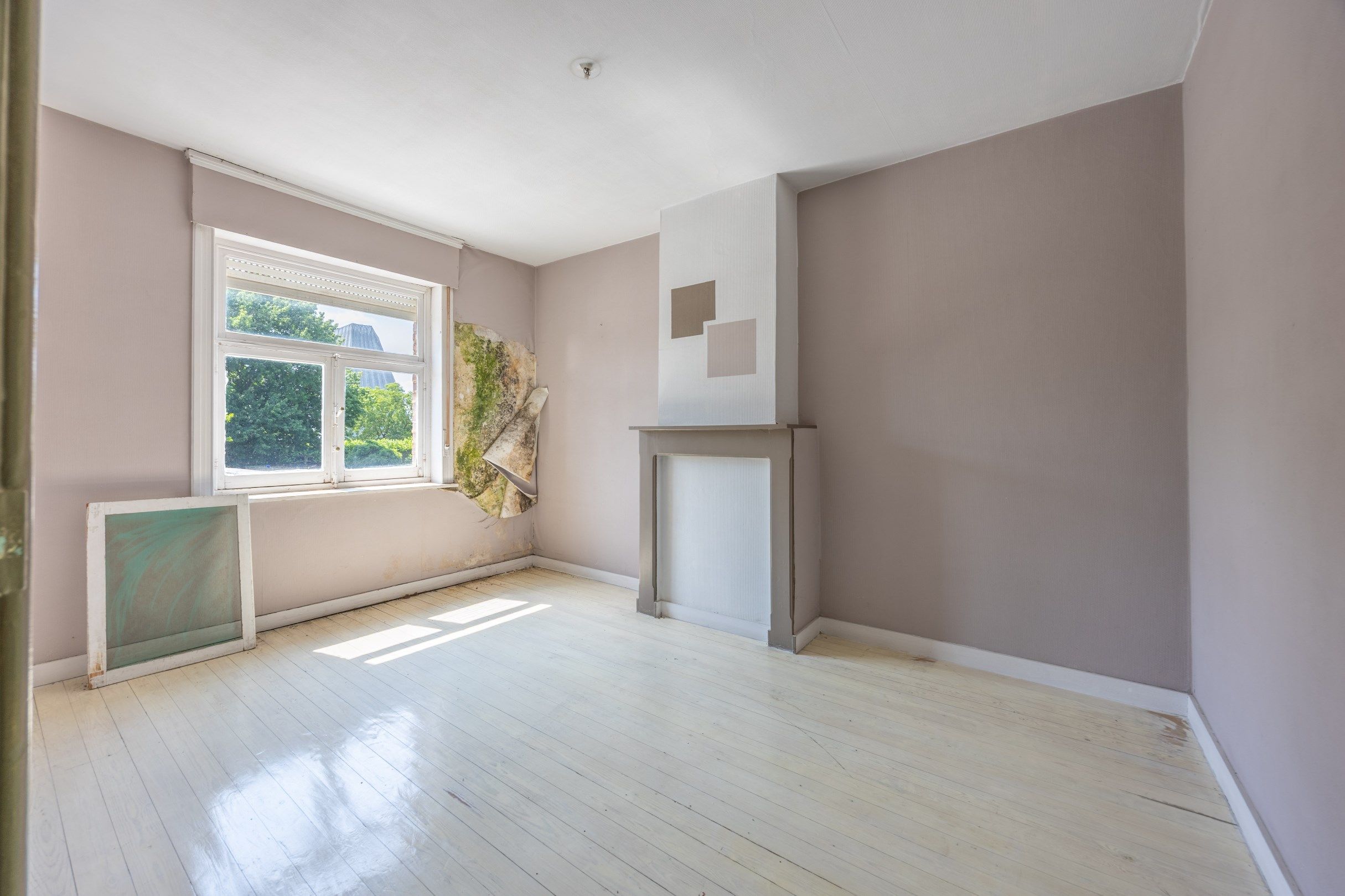 Op te knappen woning op uitstekende locatie foto 9