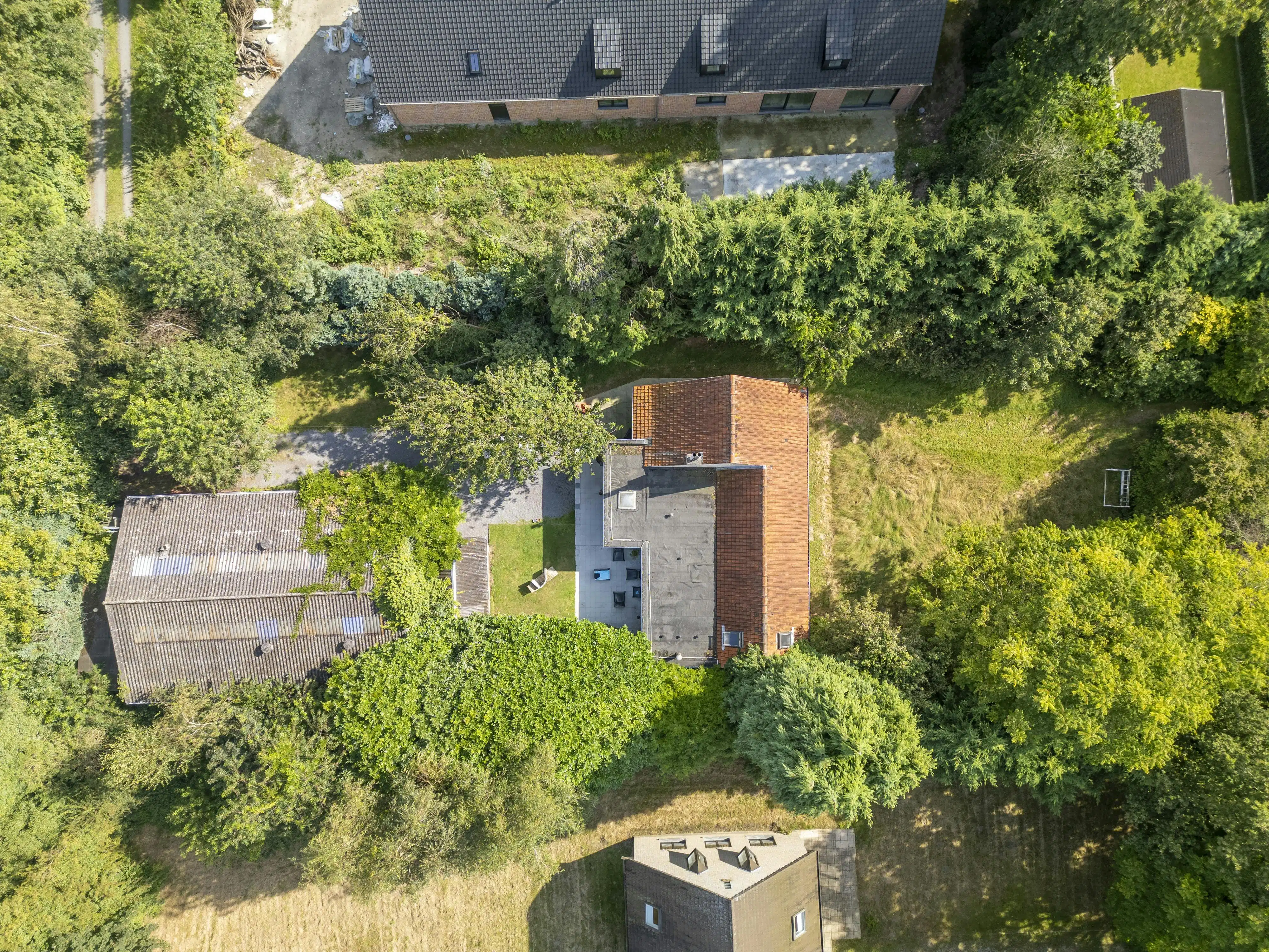 Perceel bouwgrond van 2391 m² in hartje Latem foto {{pictureIndex}}