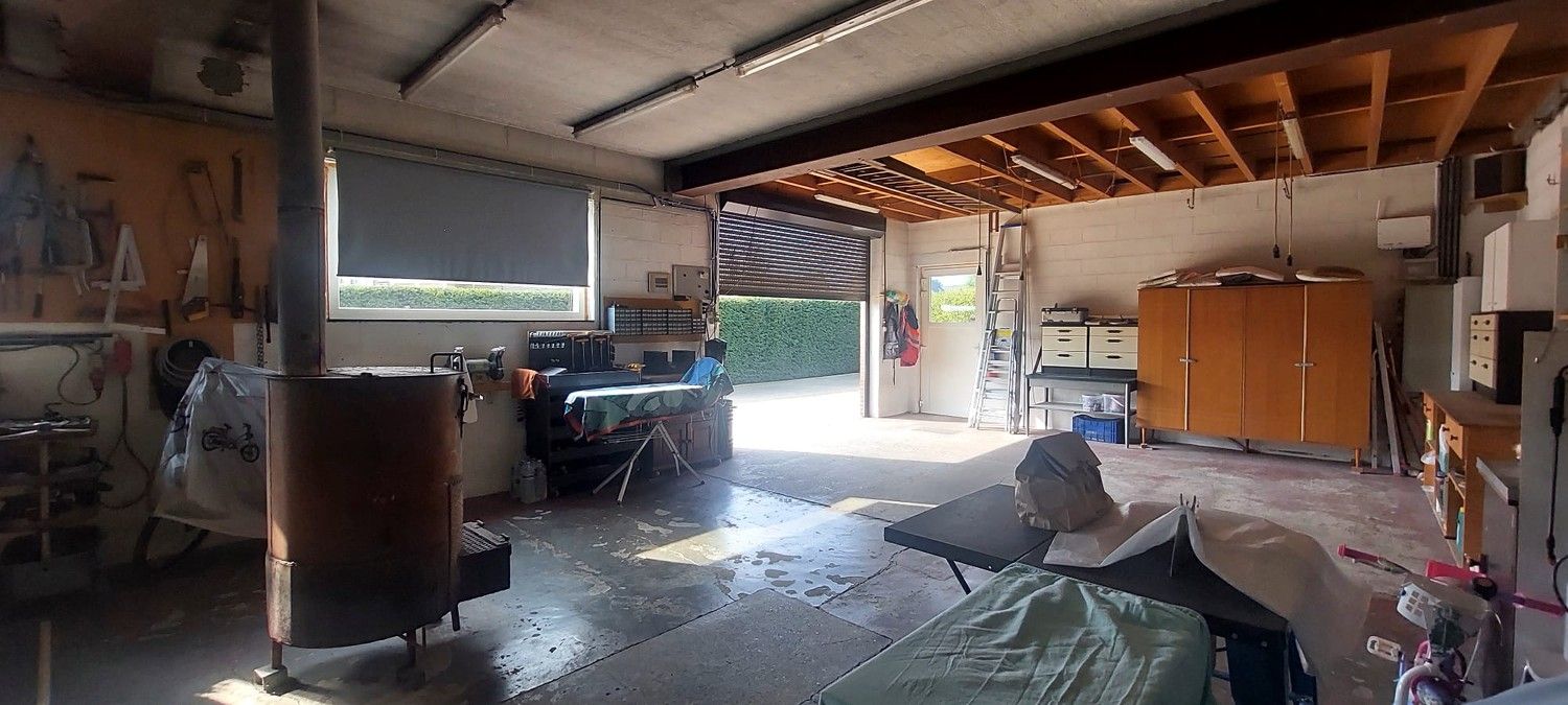 Ruime, residentieel gelegen woning met werkplaats foto 47