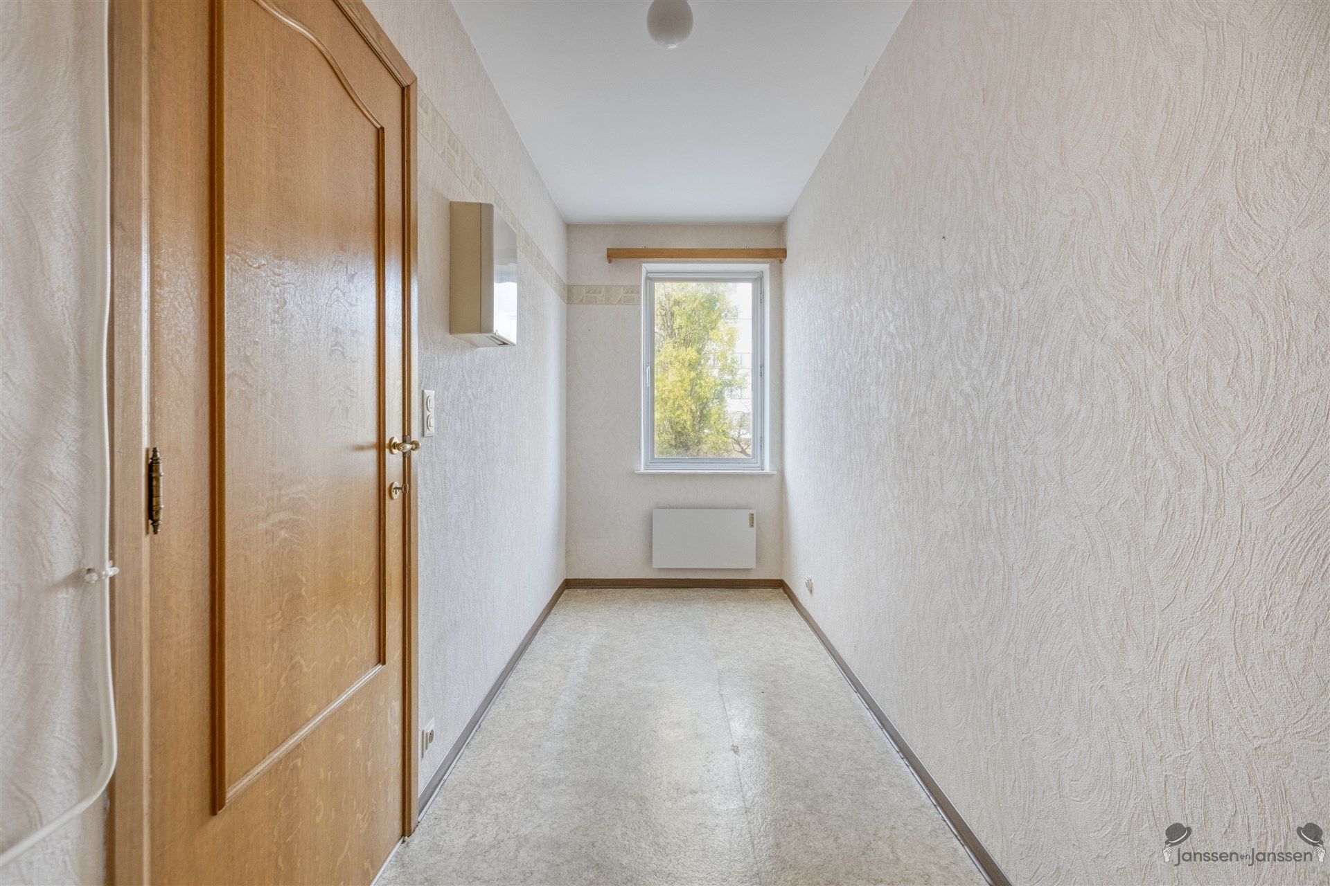 Lichtrijk 2-slaapkamerappartement met garagebox in het hart van Leopoldsburg! foto 11