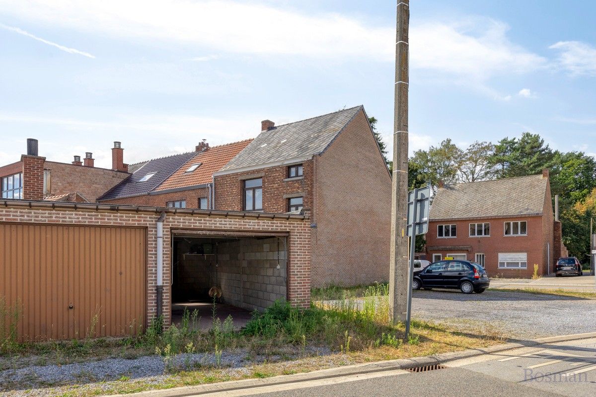 Te renoveren woning met 5 garageboxen te koop in Ham foto 29