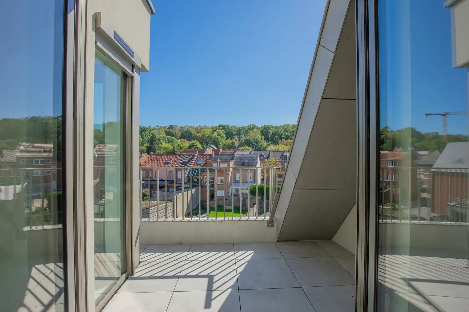 Energiezuinig dakappartement met 1 slaapkamer, aparte dressing/bureau, terras en ondergrondse staanplaats in Residentie Luster foto 7