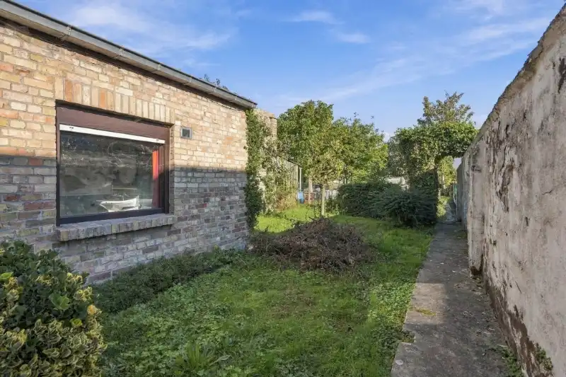 Rijwoning met tuin foto 21