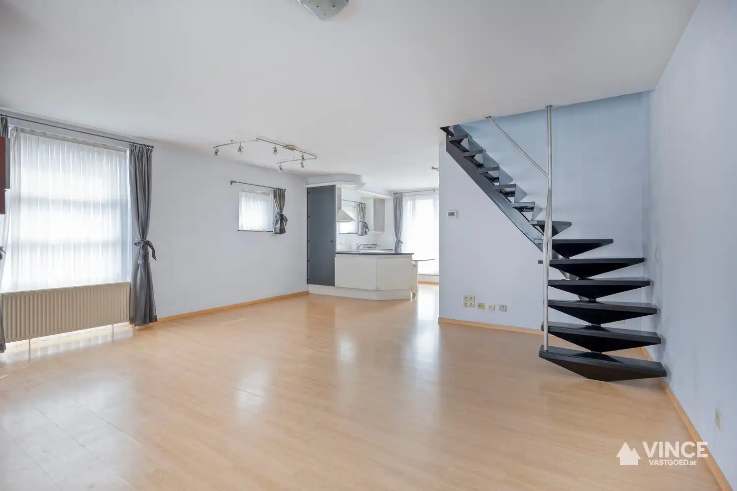 Duplex appartement met zonnig terras en garage foto 3
