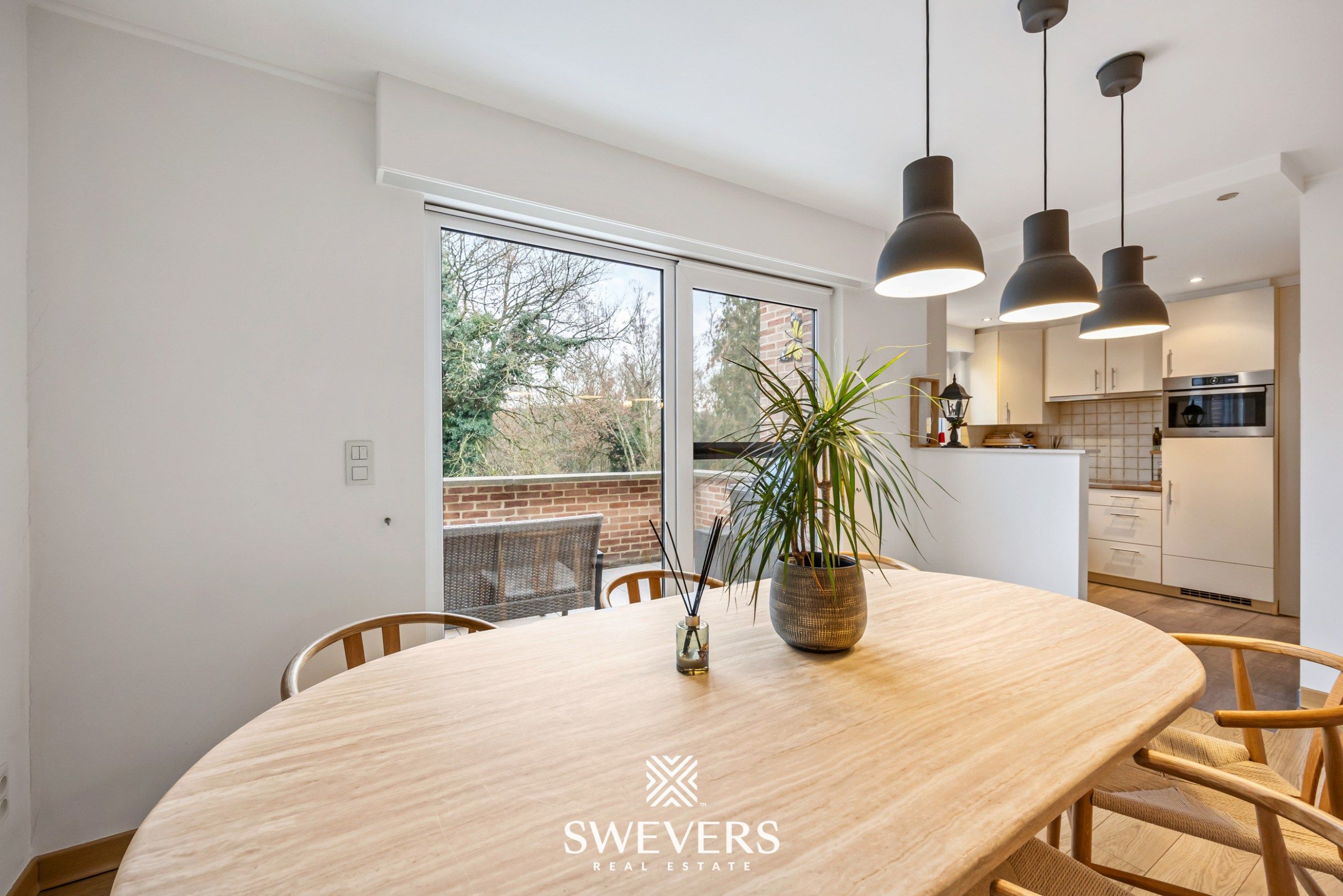 Hoogwaardig duplexappartement met zonnig terras op de bruisende Vennestraat in Genk  foto 7