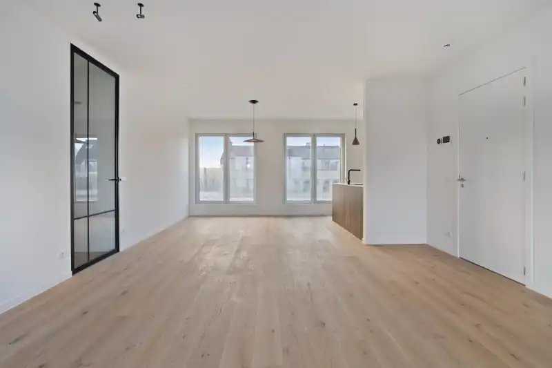 Instapklaar nieuwbouwappartement te huur in hartje Eeklo! foto 12