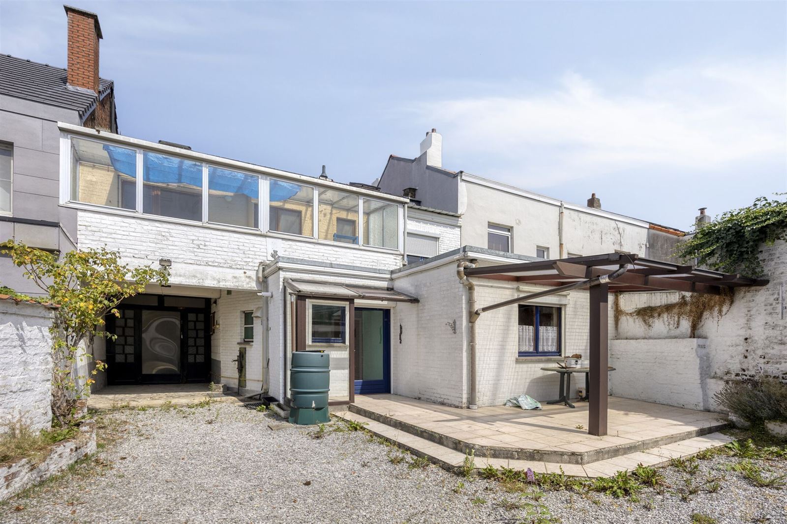 Opbrengstwoning met 2 appartementen en 3 garageboxen foto 30