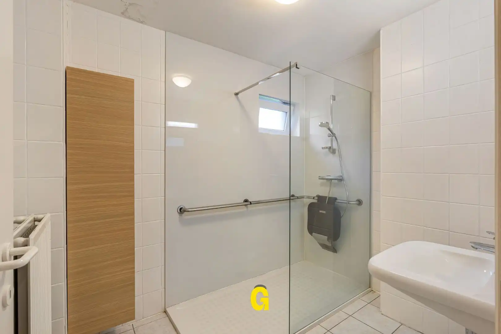 Degelijk (rolstoelvriendelijk) gelijkvoersappartement met terras uitgevend op de tuin, afsluitbare garage en berging foto 3