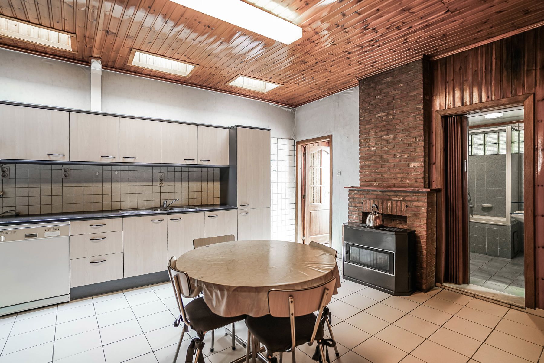 Te renoveren rijwoning met tuin te Steenhuffel foto 8