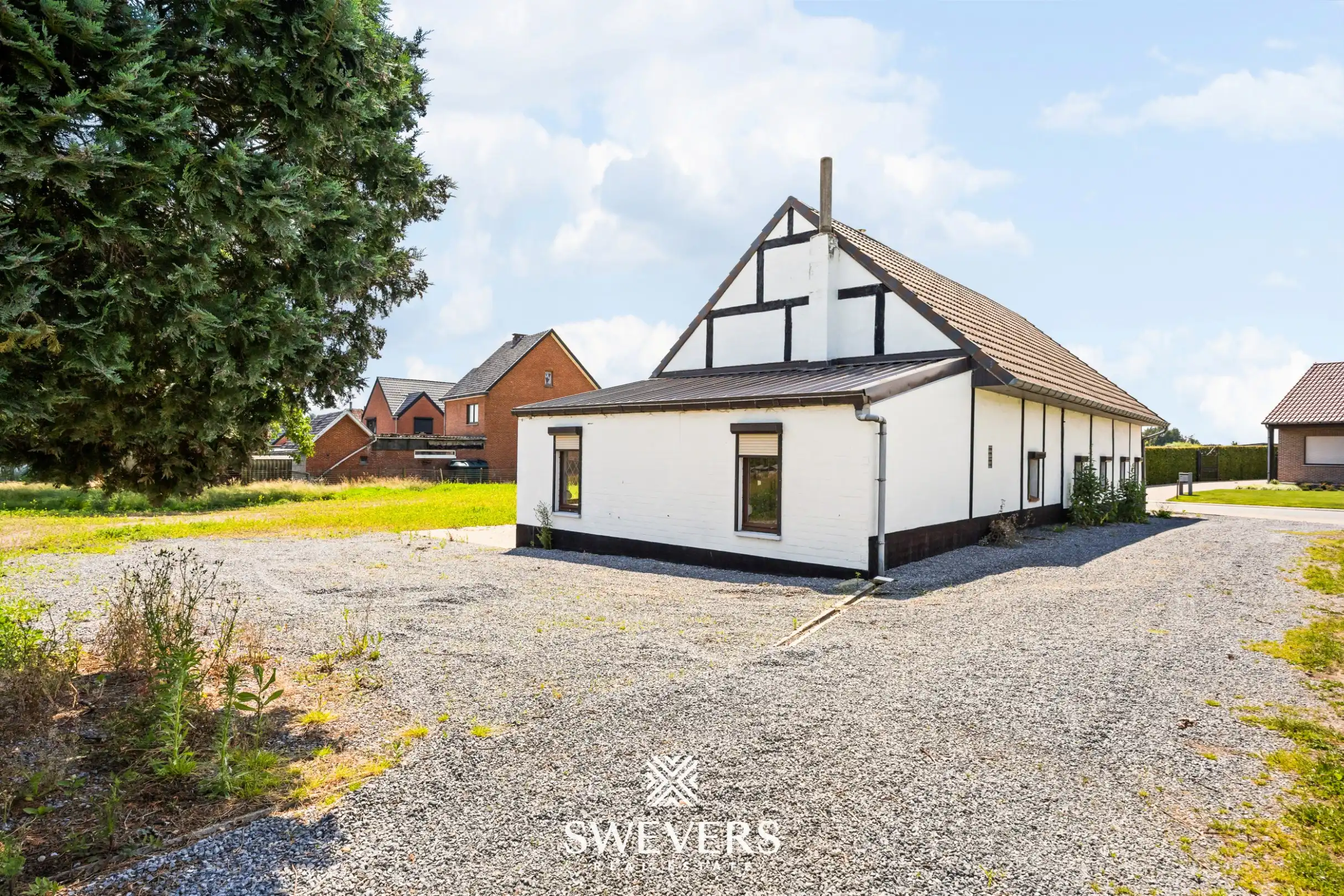Vrijstaande woning met groot perceel en enorm renovatiepotentieel in Herk-de-Stad foto 8