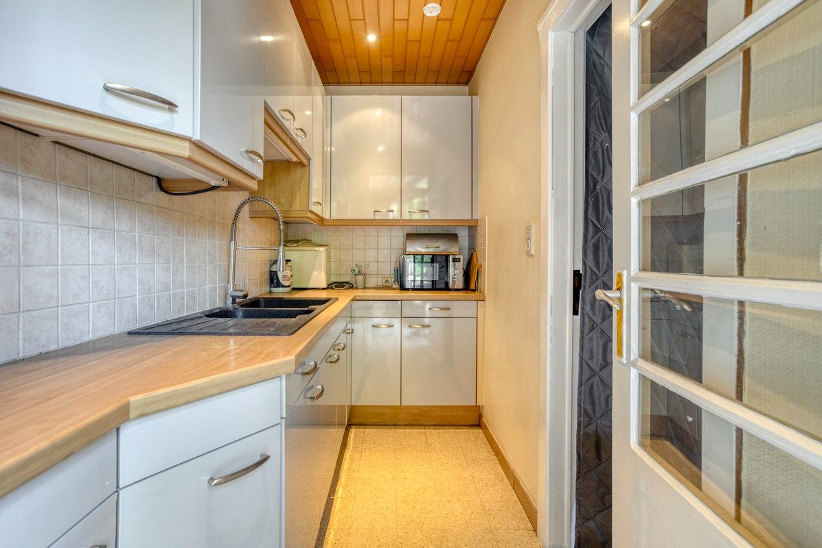 Te renoveren woning met naastliggend bouwperceel! foto 7