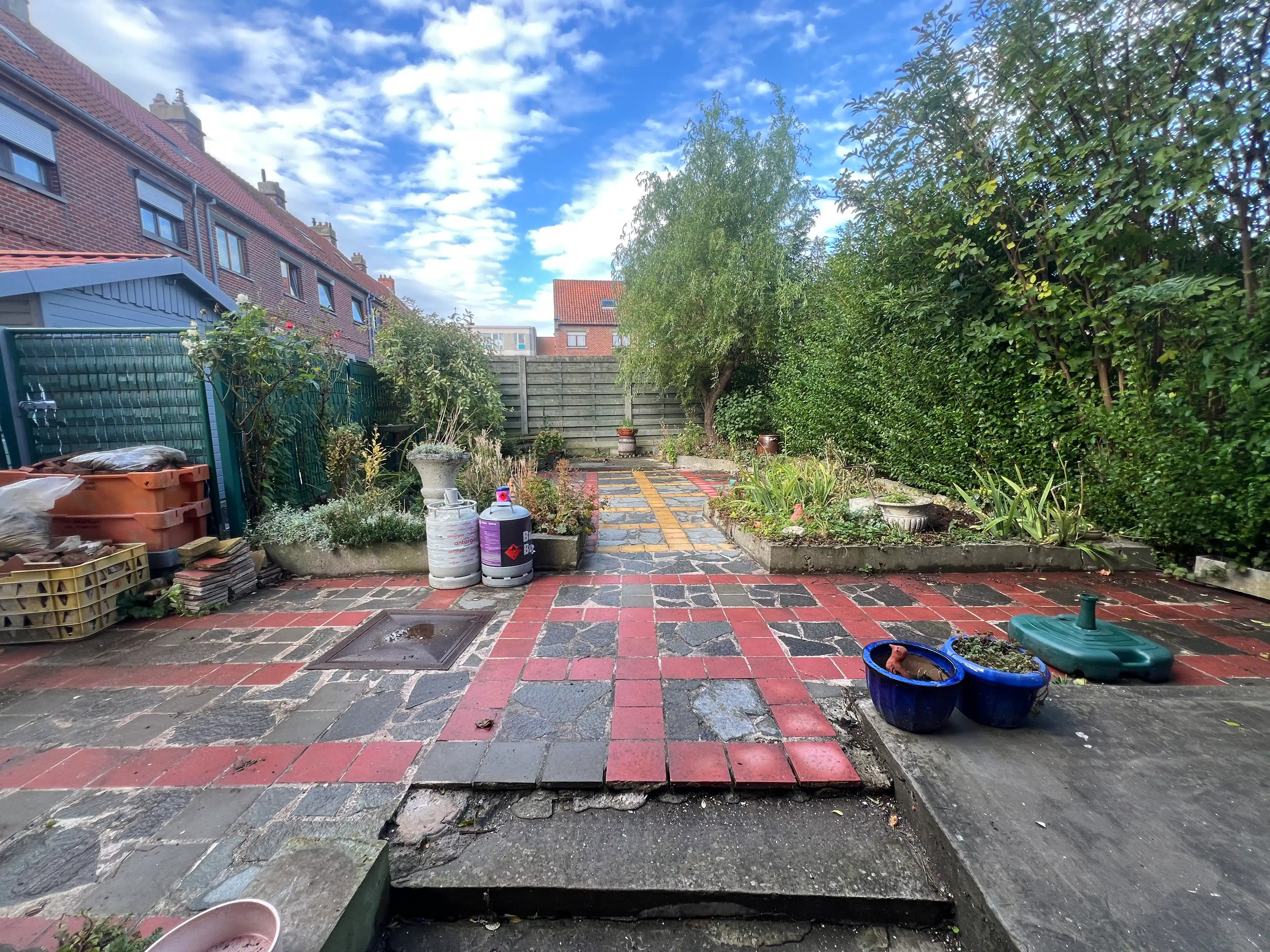 Halfopen bebouwing met zonnige tuin foto 3