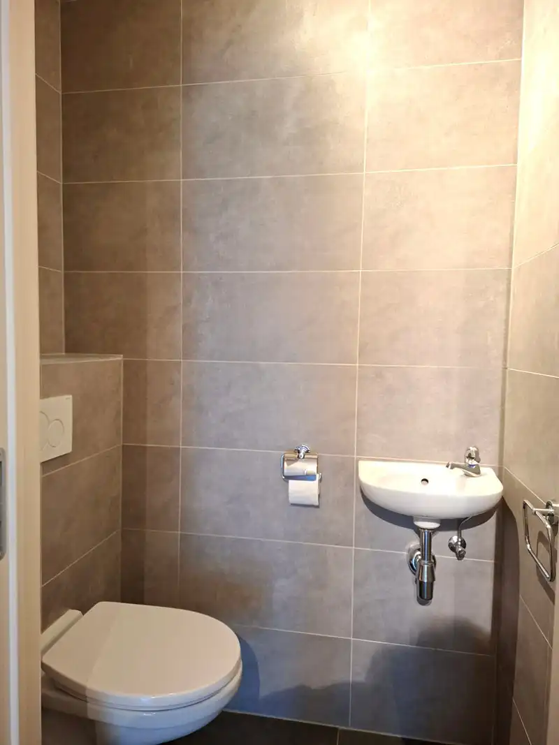 Modern en stijlvol gelijkvloers appartement net buiten Genk centrum foto 17