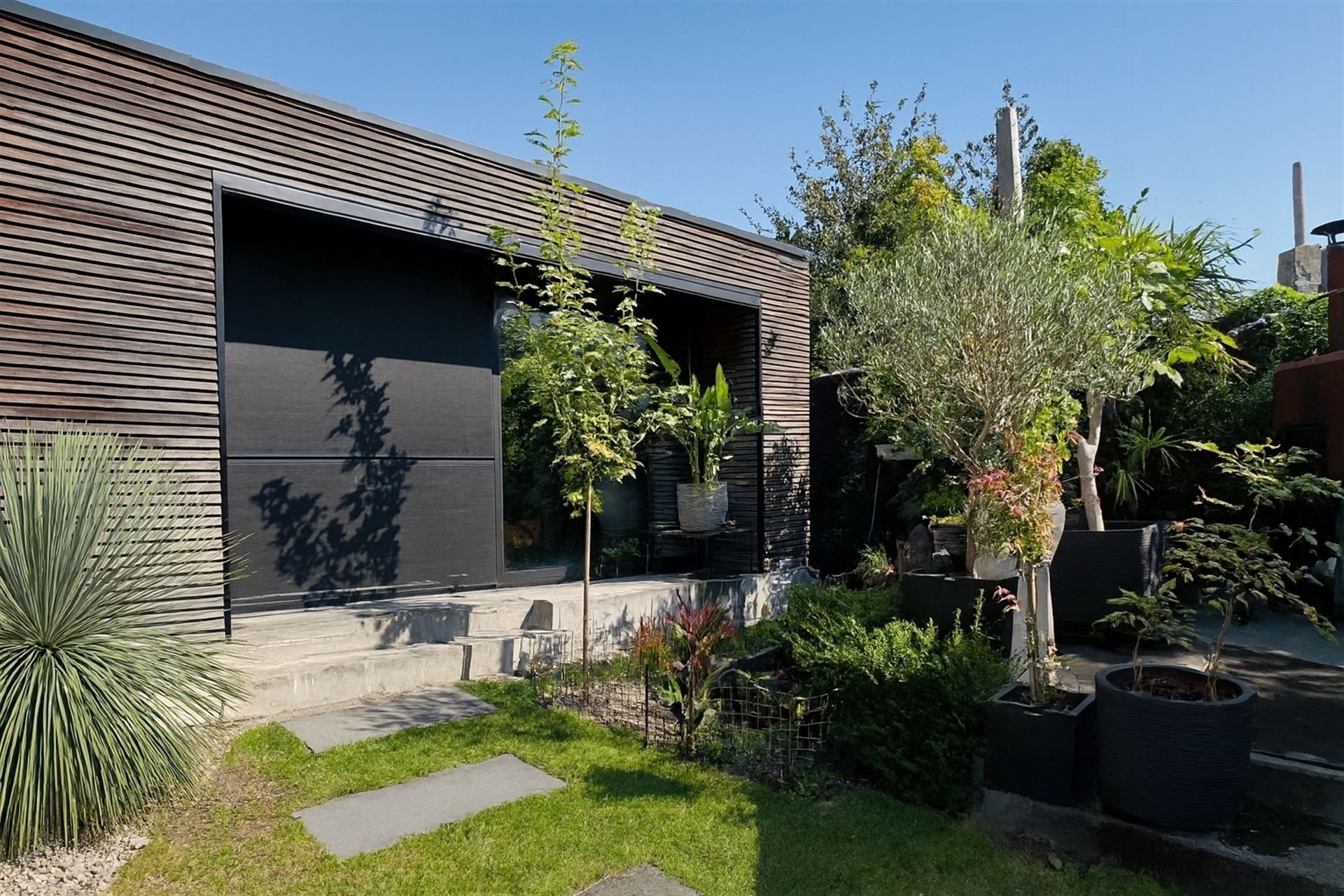 Unieke woonst met verborgen tuinoase foto 14