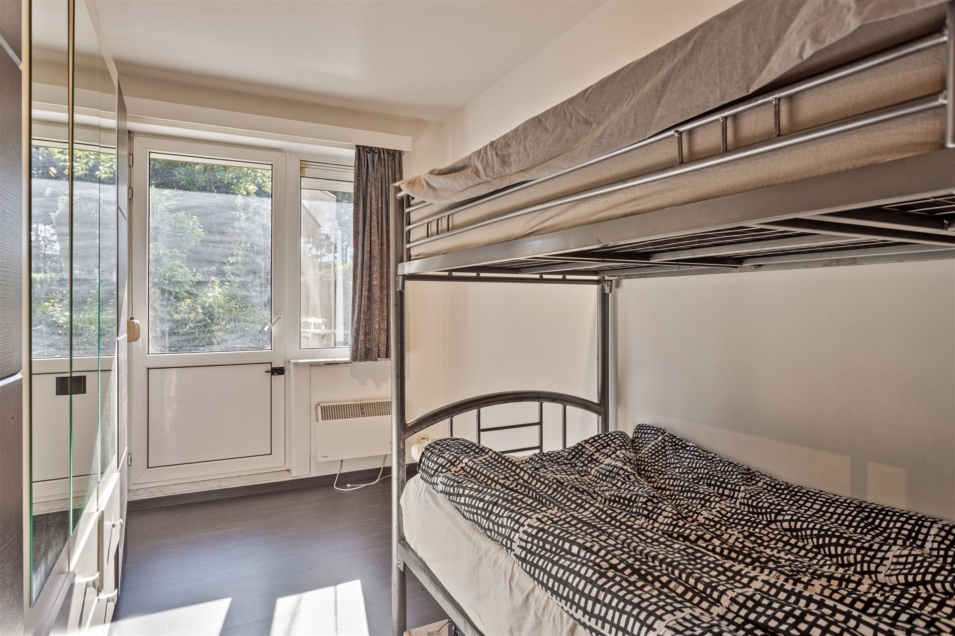 Gelijkvloers appartement met grote tuin foto 8