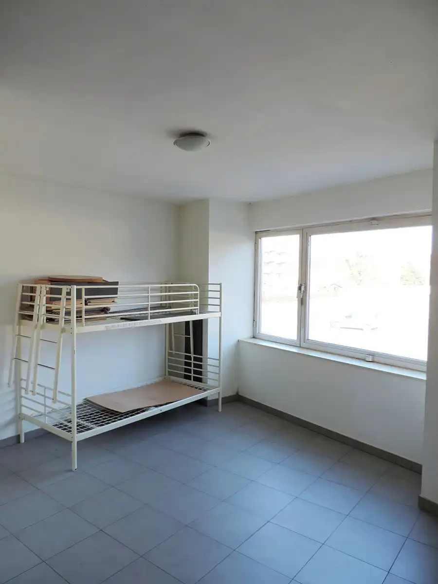 Opbrengsteigendom met handelsgelijkvloers en 2 appartementen foto 5