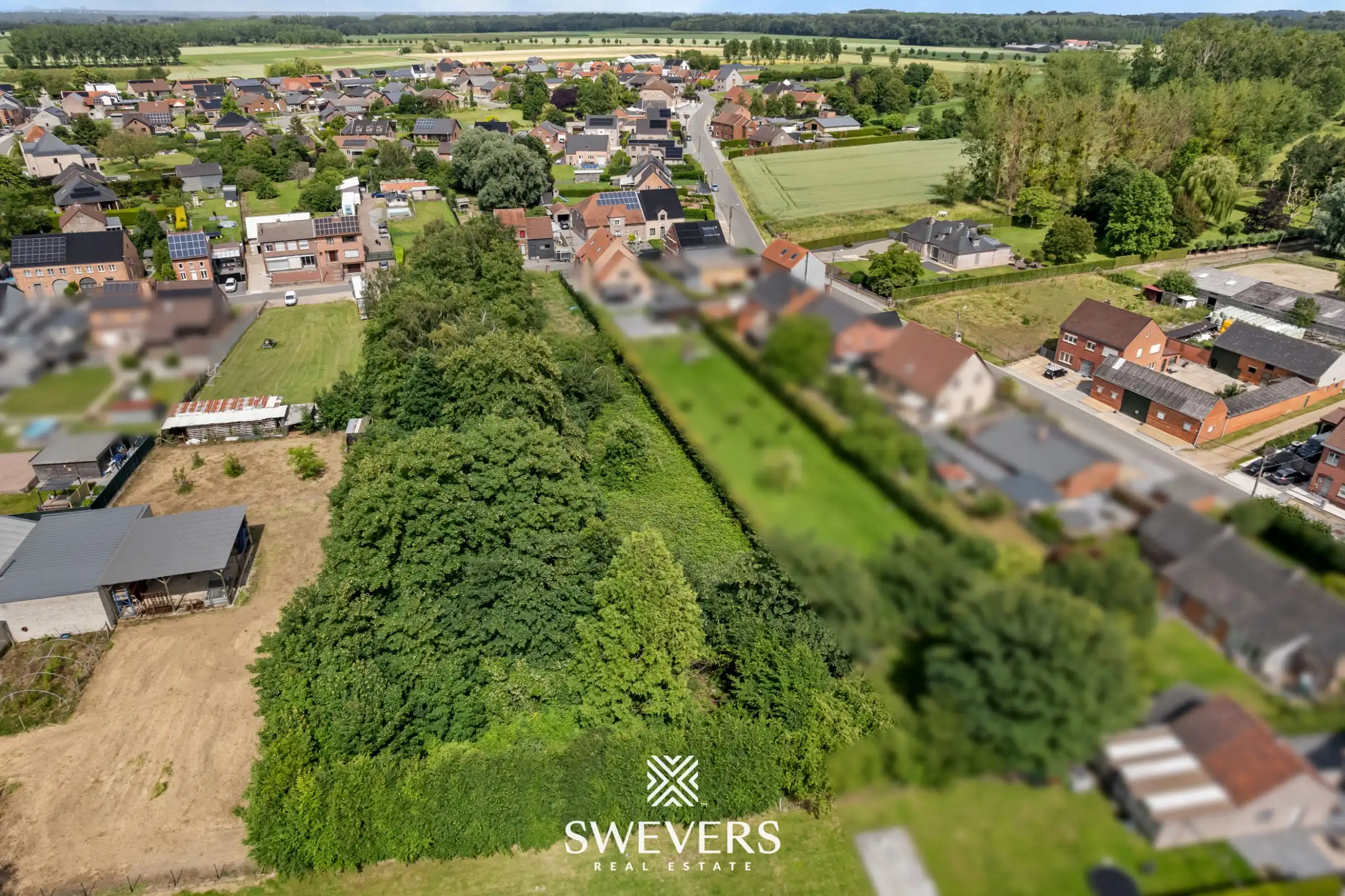 Landelijk gelegen bouwgrond van 17a 80ca met omliggend agrarisch gebied op rustige straat te Wellen foto 17