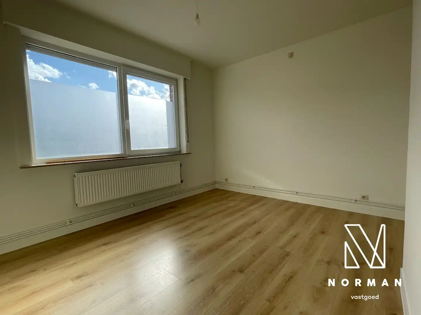 Instapklare, stijlvol gerenoveerde woning nabij het centrum van Kuurne foto 9