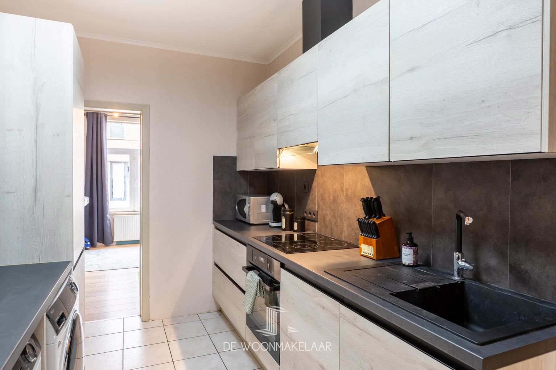 Gelijkvloers appartement met 3 SLK's, diepe tuin én garage foto 9