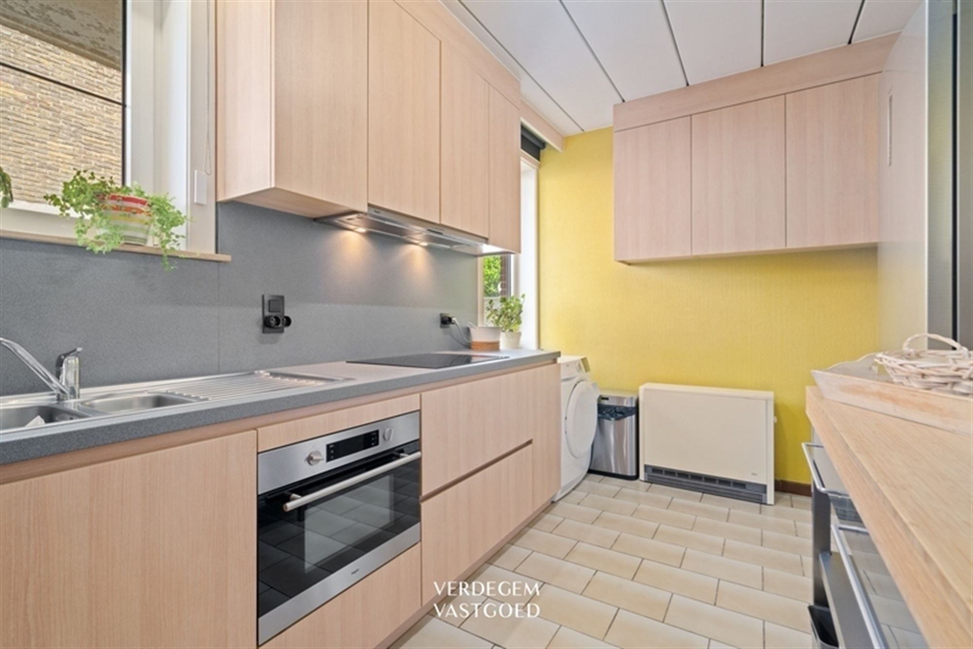 Gelijkvloers appartement met 2 slaapkamers, garage en privatieve tuin foto 6