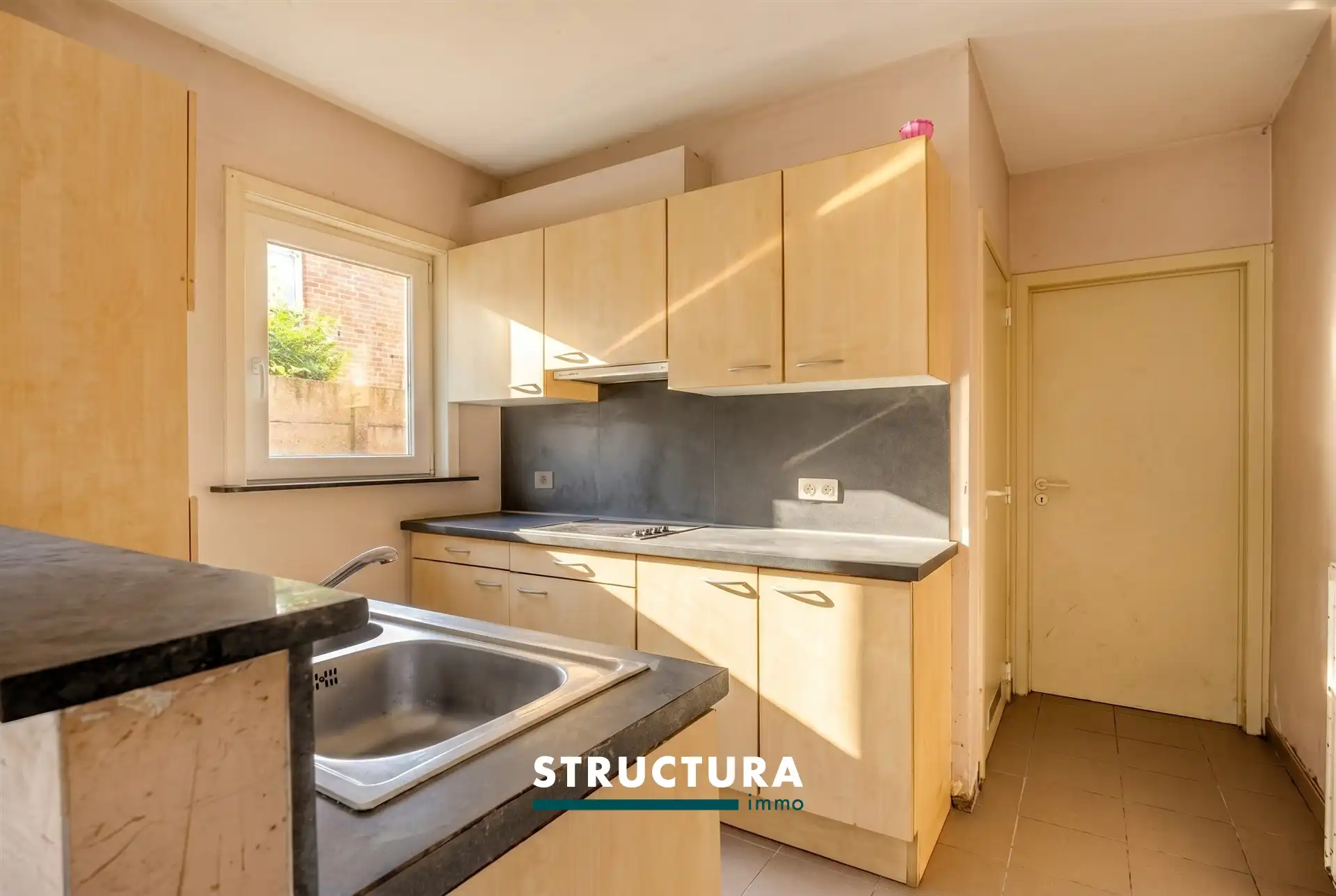 Op te frissen/ te renoveren gelijkvloers appartement met 2 kamers en tuin foto 5