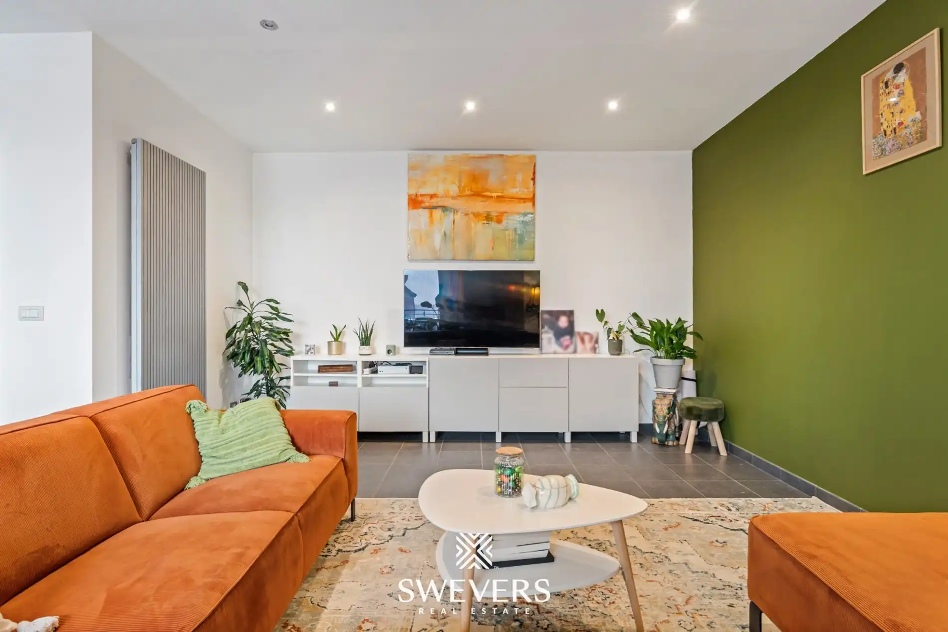 Ruim appartement met dubbele garage en groot terras vlakbij het centrum van Heusden foto 4