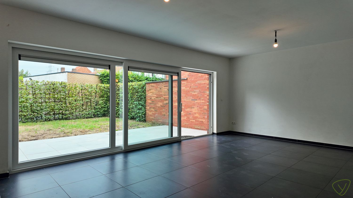 Recente gezinswoning met zonnige tuin, garage en centrale ligging! foto 2