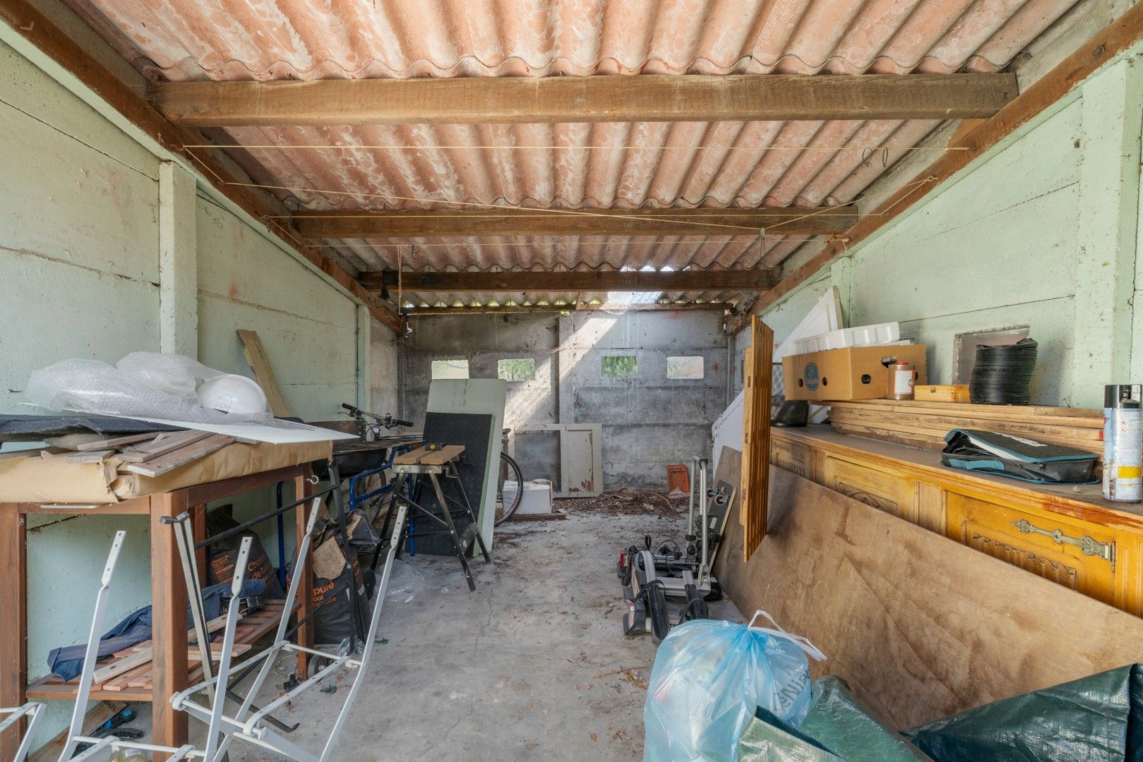 Halfopen woning met tuin en garages in het centrum van Nevele! foto 21