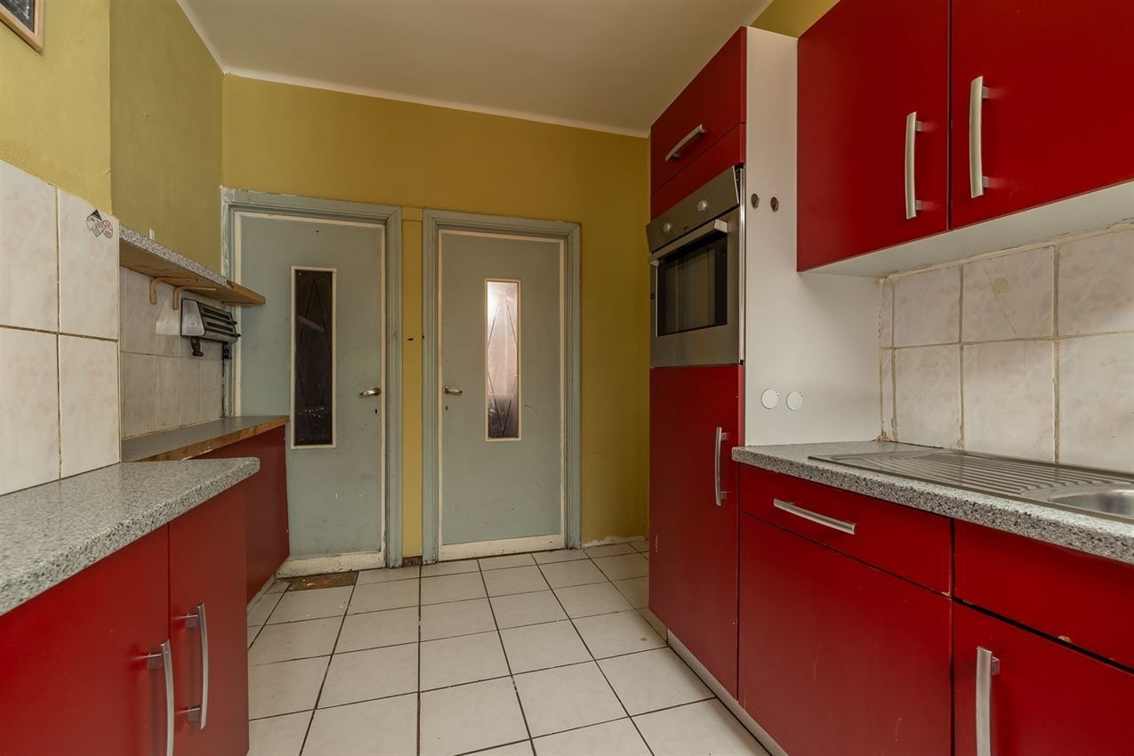 Ruime woning met zuidgerichte tuin en garage in rustige straat nabij centrum. EPC C en 5+ slaapkamers. foto 14