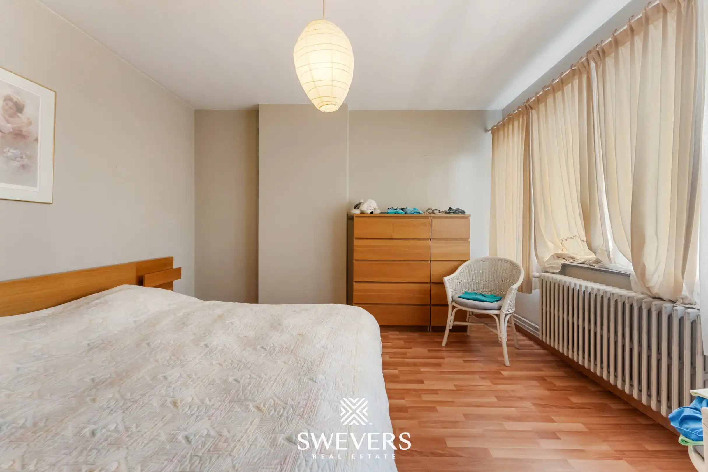 Ruime halfopen bebouwing met 4 slaapkamers en veel renovatiepotentieel op topligging in Hasselt foto 13