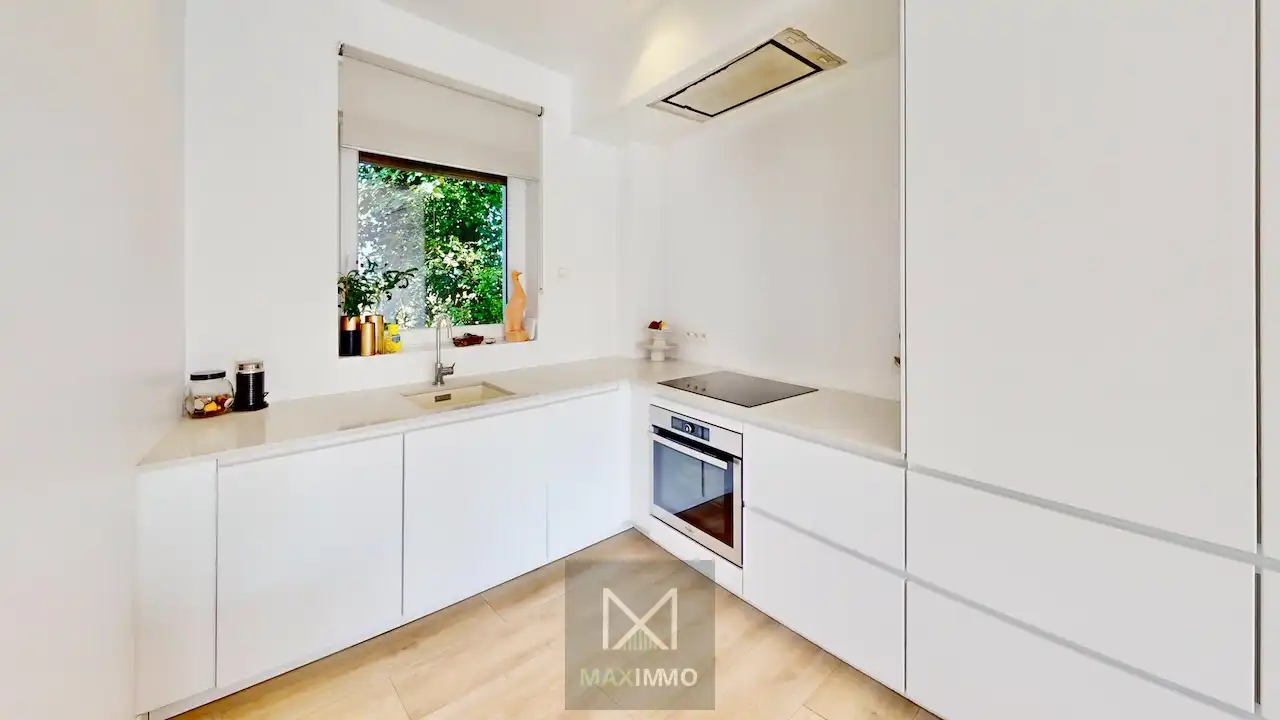 Wonen of investeren: instapklare halfopen woning met tuin foto 5