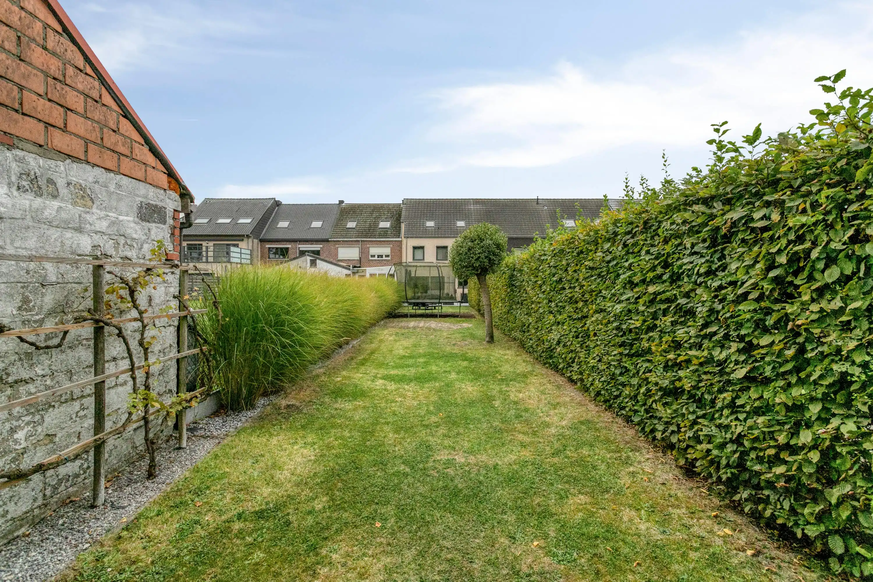 Ruim instapklaar huis: 4 slaapkamers, garage en grote tuin foto 13