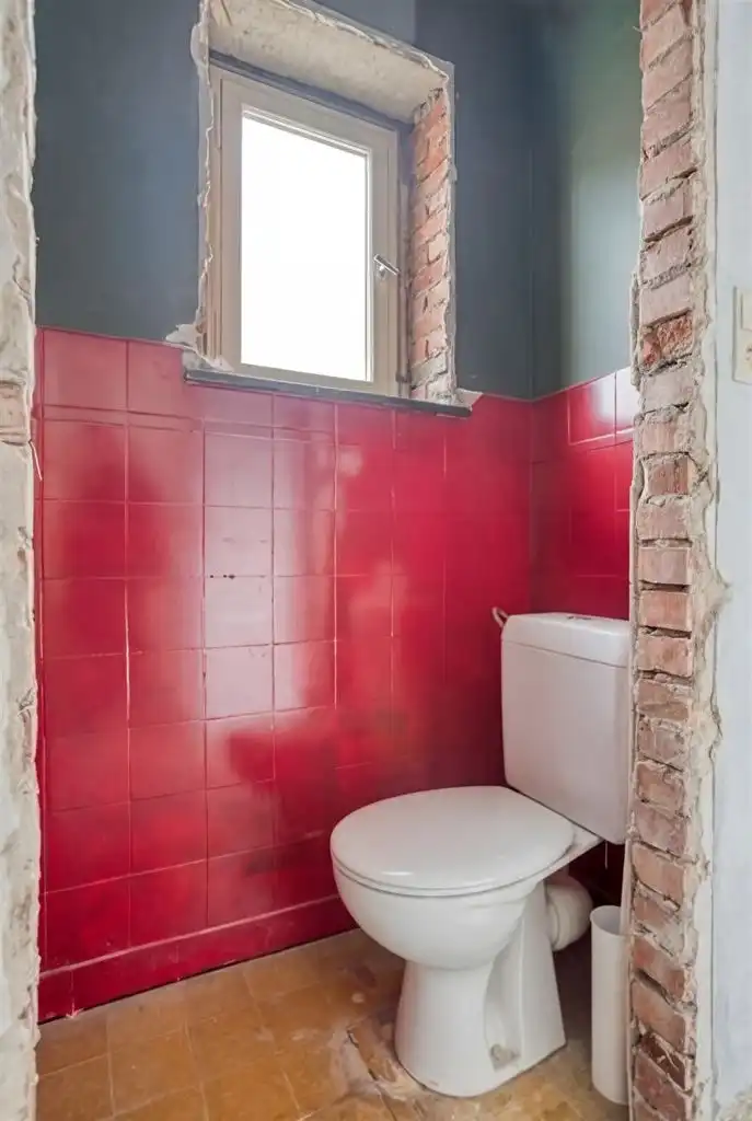 Te renoveren hoekwoning met tal van mogelijkheden, gelegen op een absolute toplocatie in het hart van het historisch stadscentrum van Bree.  foto 24