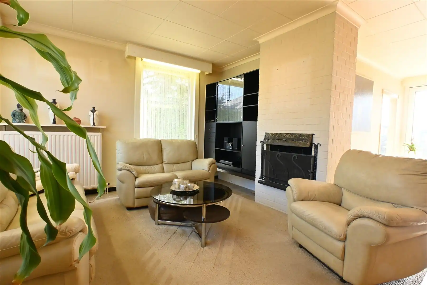 Gelijkvloerse woning met zonnige tuin in rustige woonbuurt foto 3