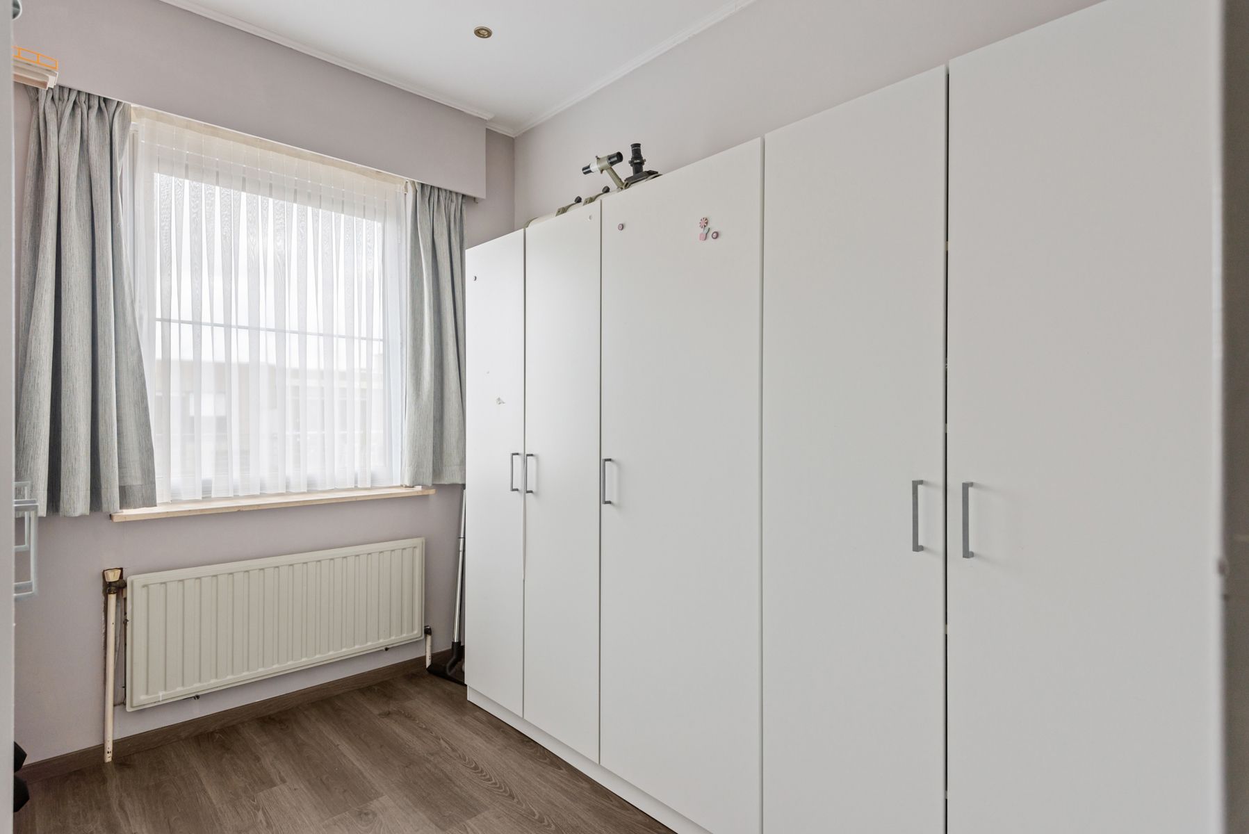 Appartement met terrasje, kelder en garagebox bij centrum foto 13