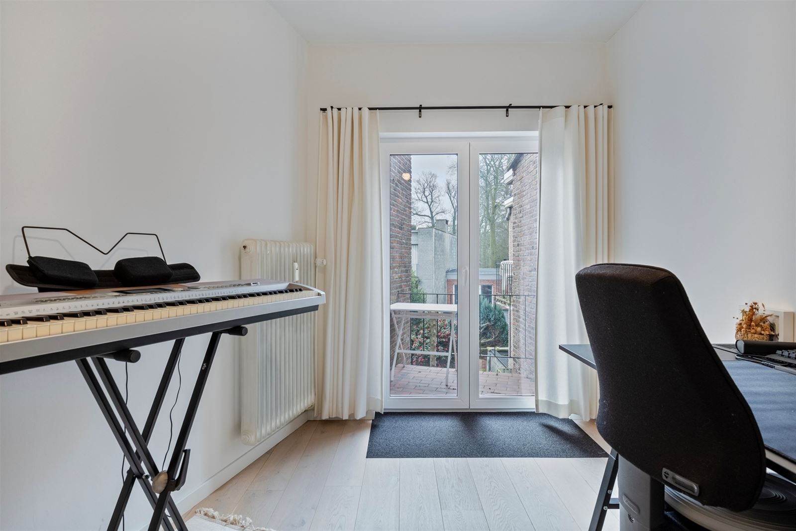 Modern gerenoveerd 2 slaapkamer appart. foto 12