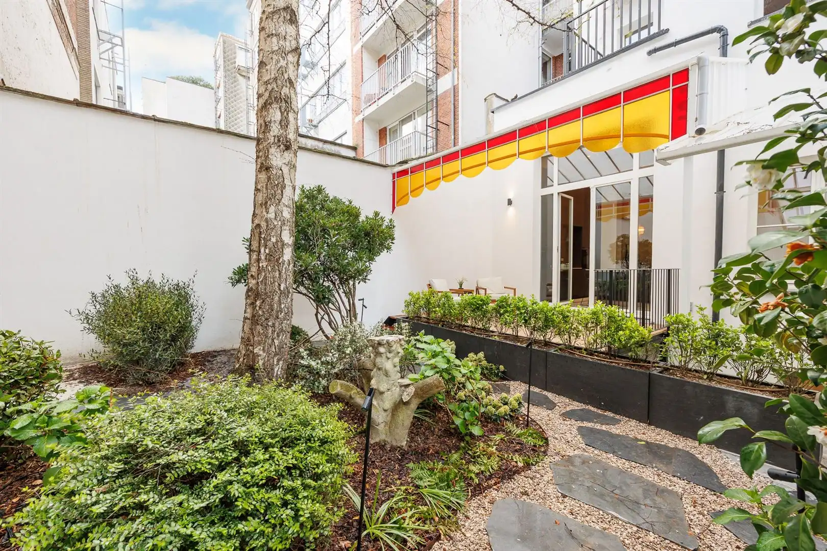 Renovatie met Parijse flair & stadstuin foto 23