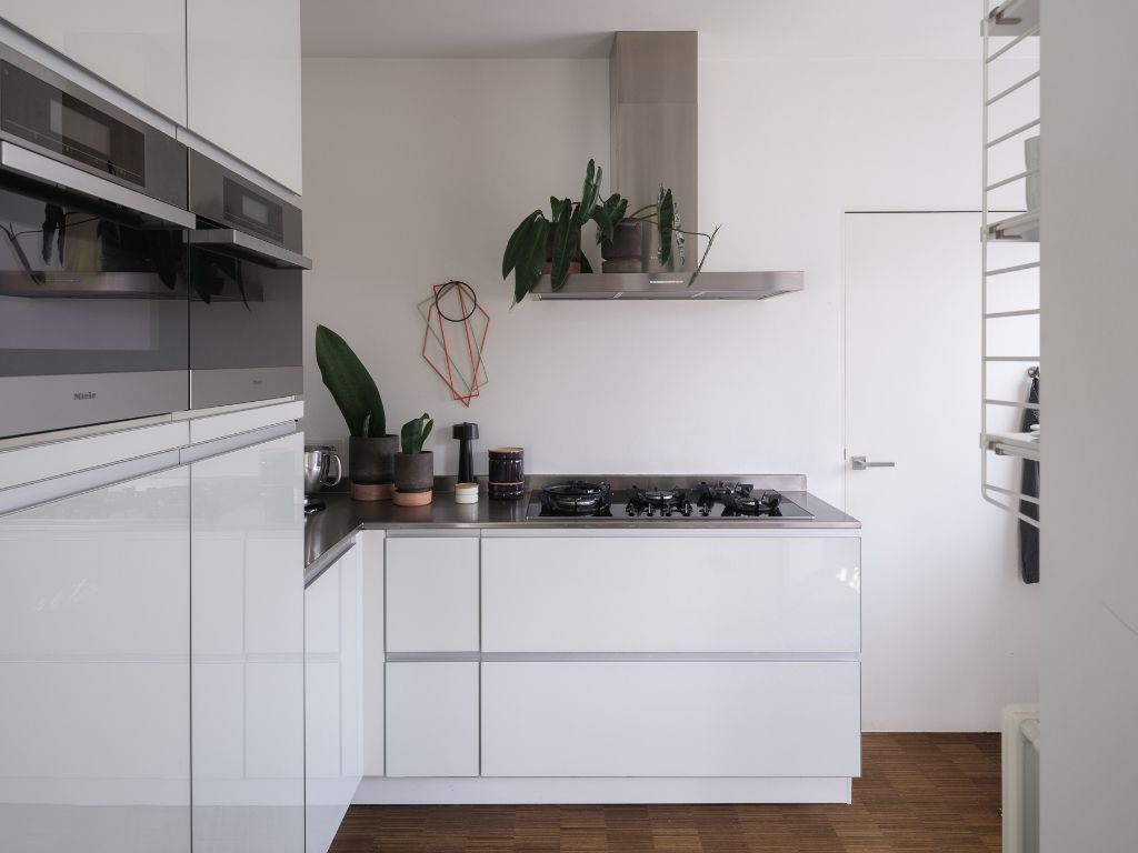 Kwalitatieve design bel-étage met 3 slaapkamers (mogelijkheid tot 5), bureauruimte en goed georiënteerde tuin te Sint-Amandsberg. foto 10