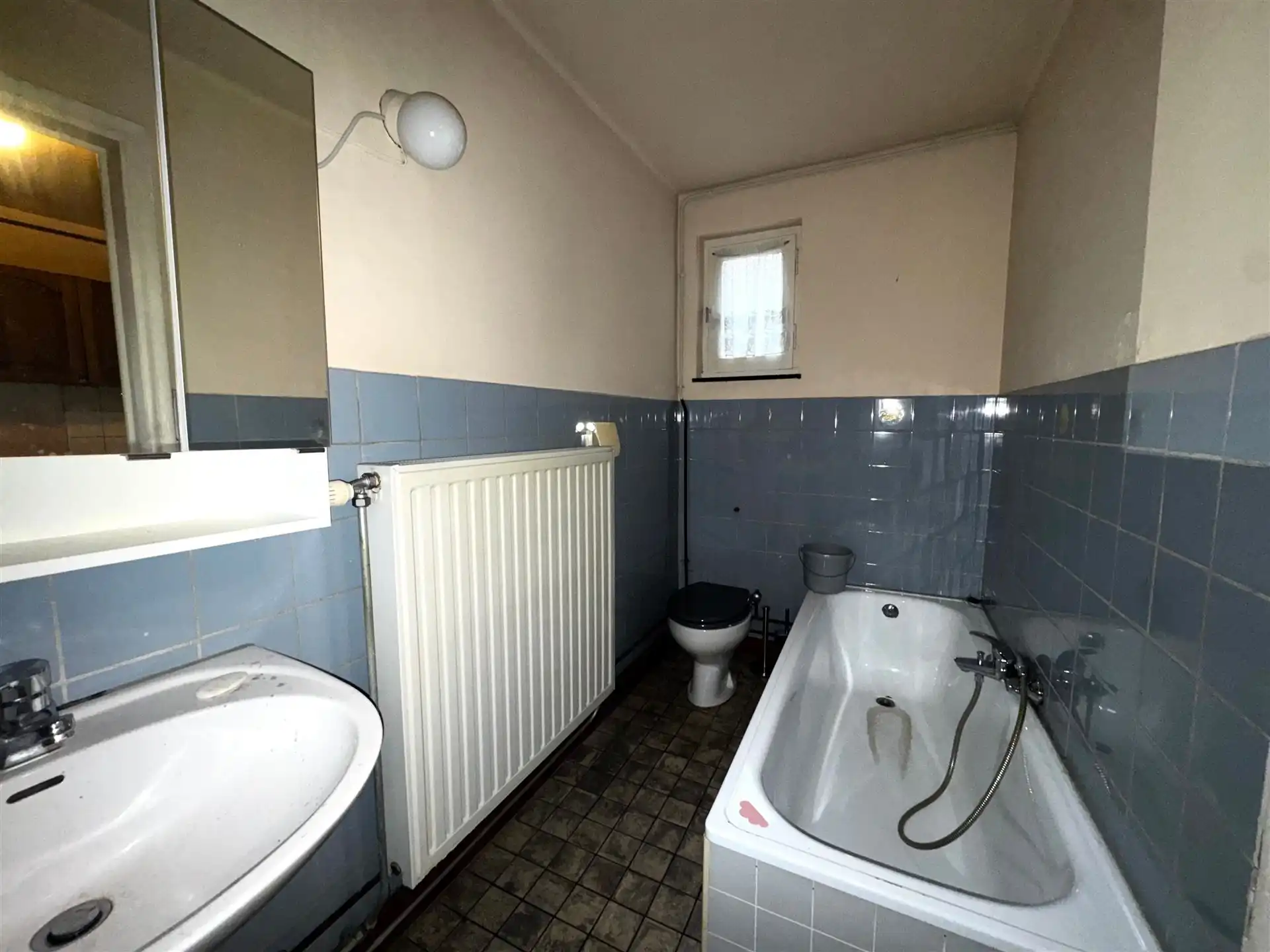 Halfopen te verbouwen woning op rustige locatie in Maasmechelen foto 8